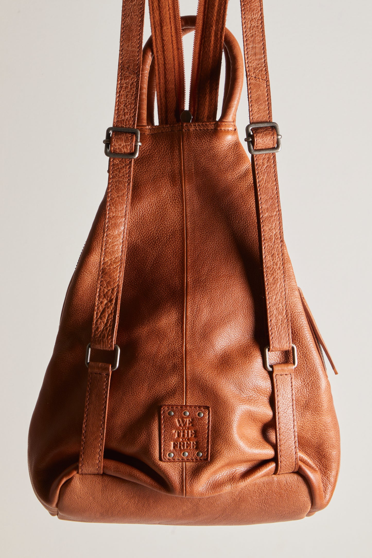 Soho Convertible Sling Bag in Distressed Brown
