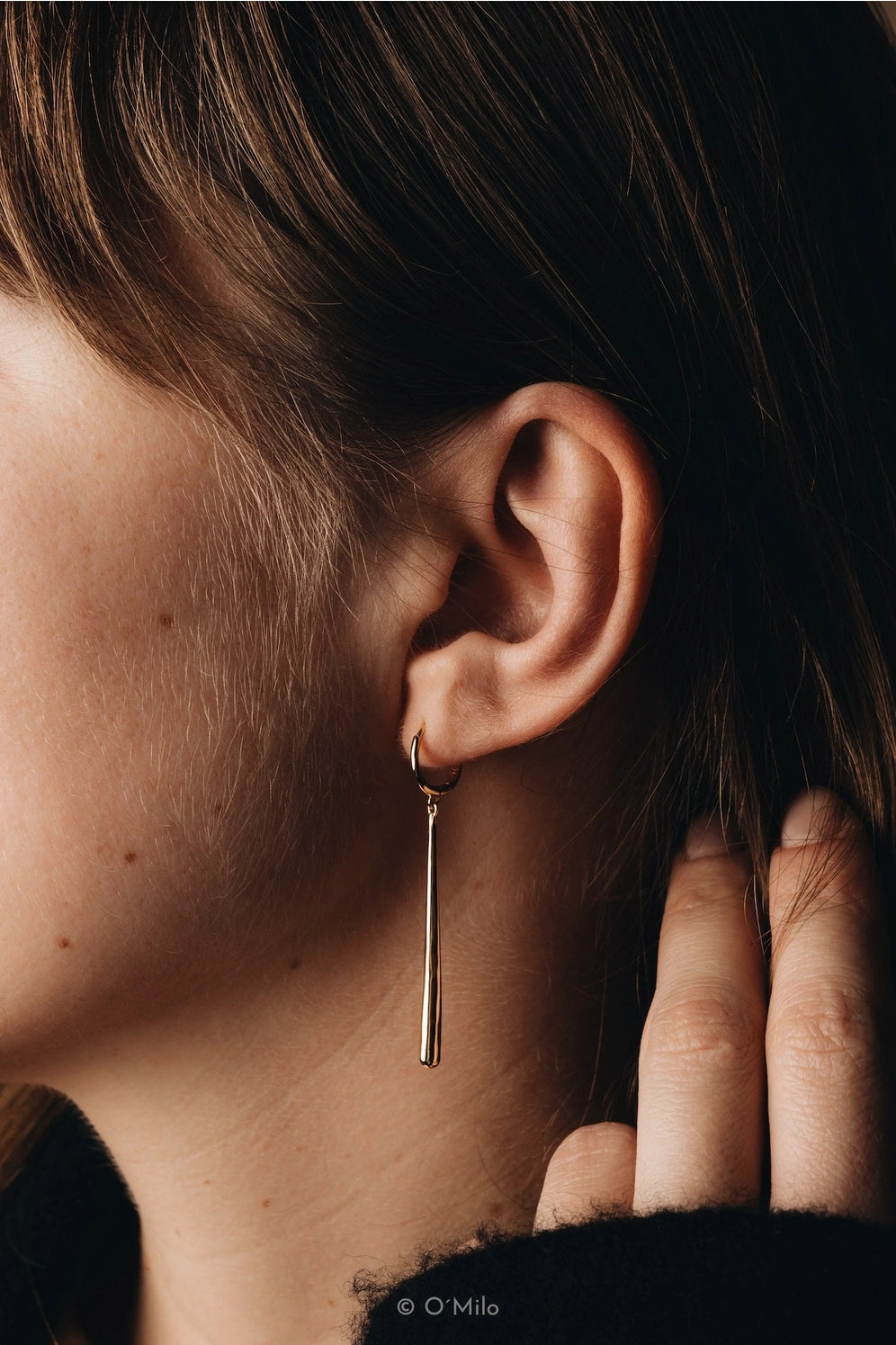 Vela Golden Pendulum Earrings