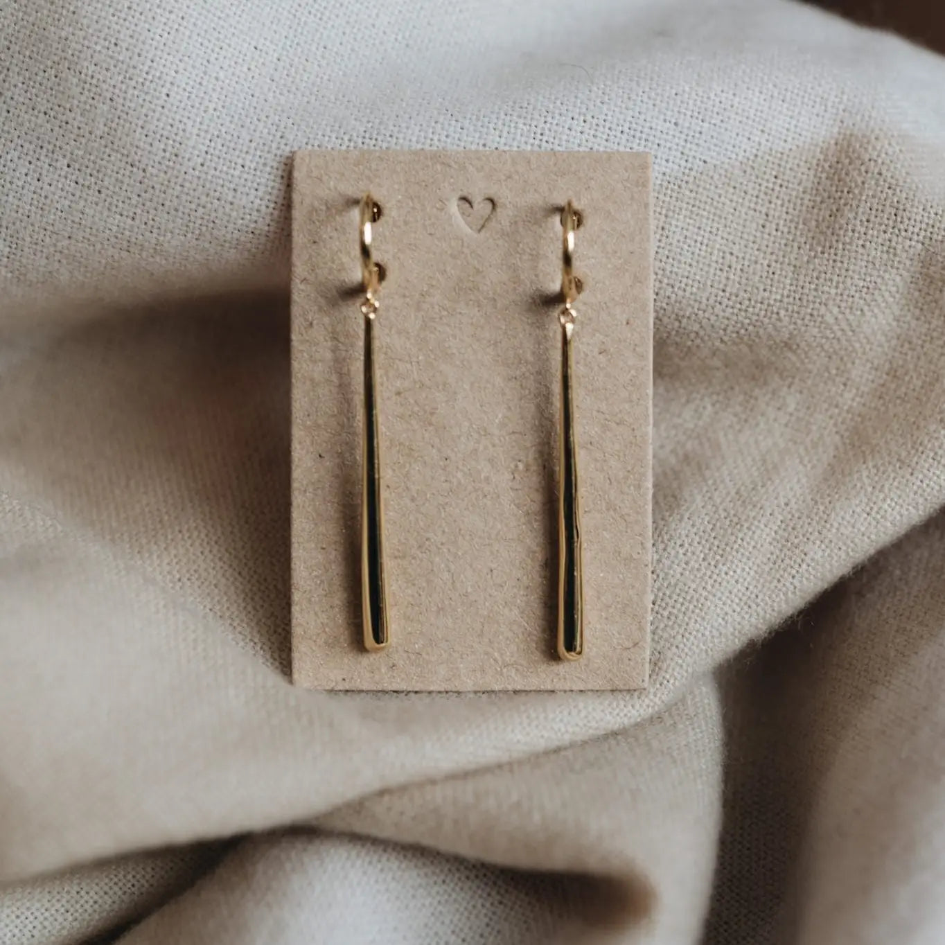 Vela Golden Pendulum Earrings